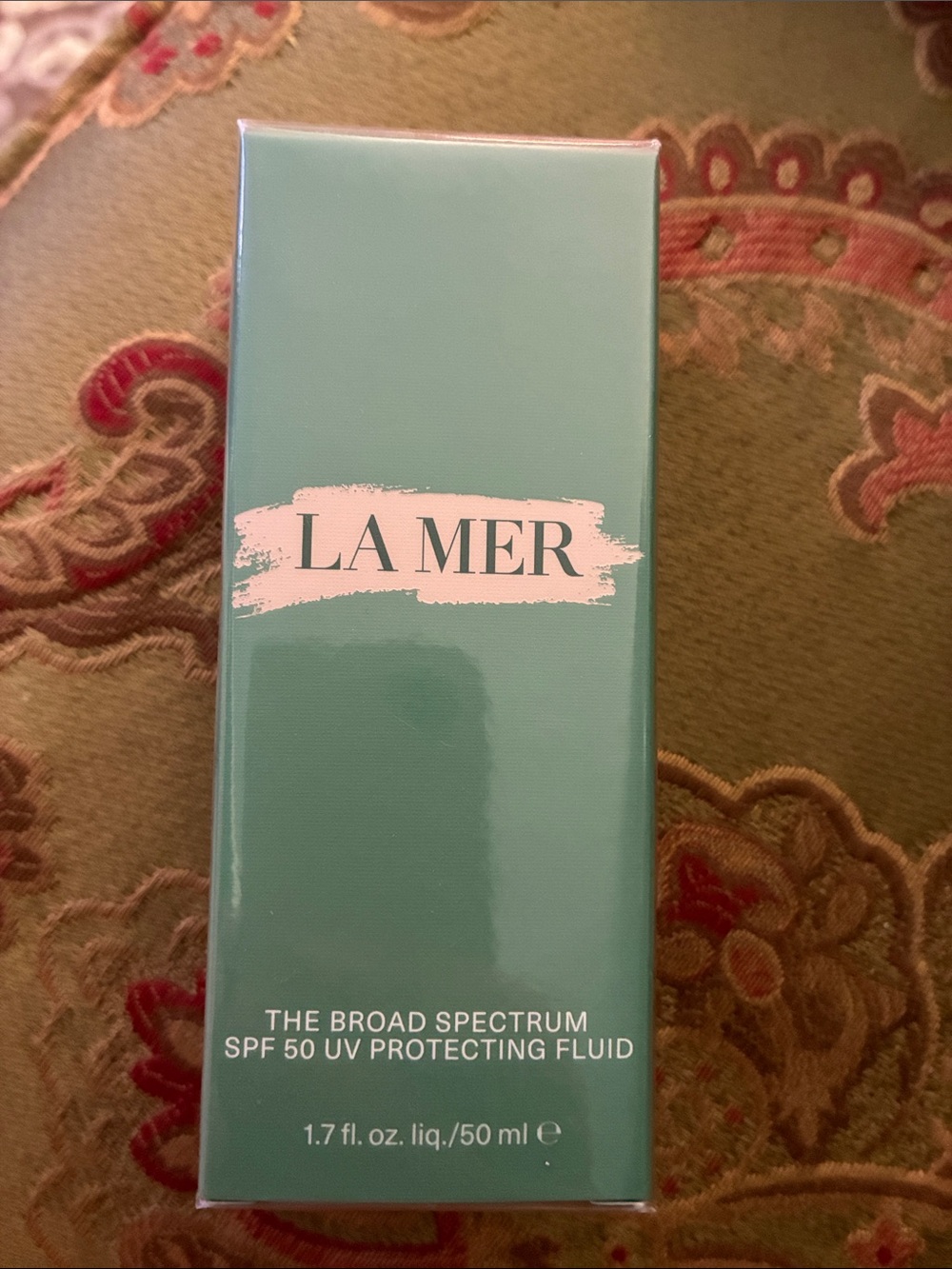 La Mer Broad Spectrum SPF 50 UV Protecting Fluid - Teal Packaging